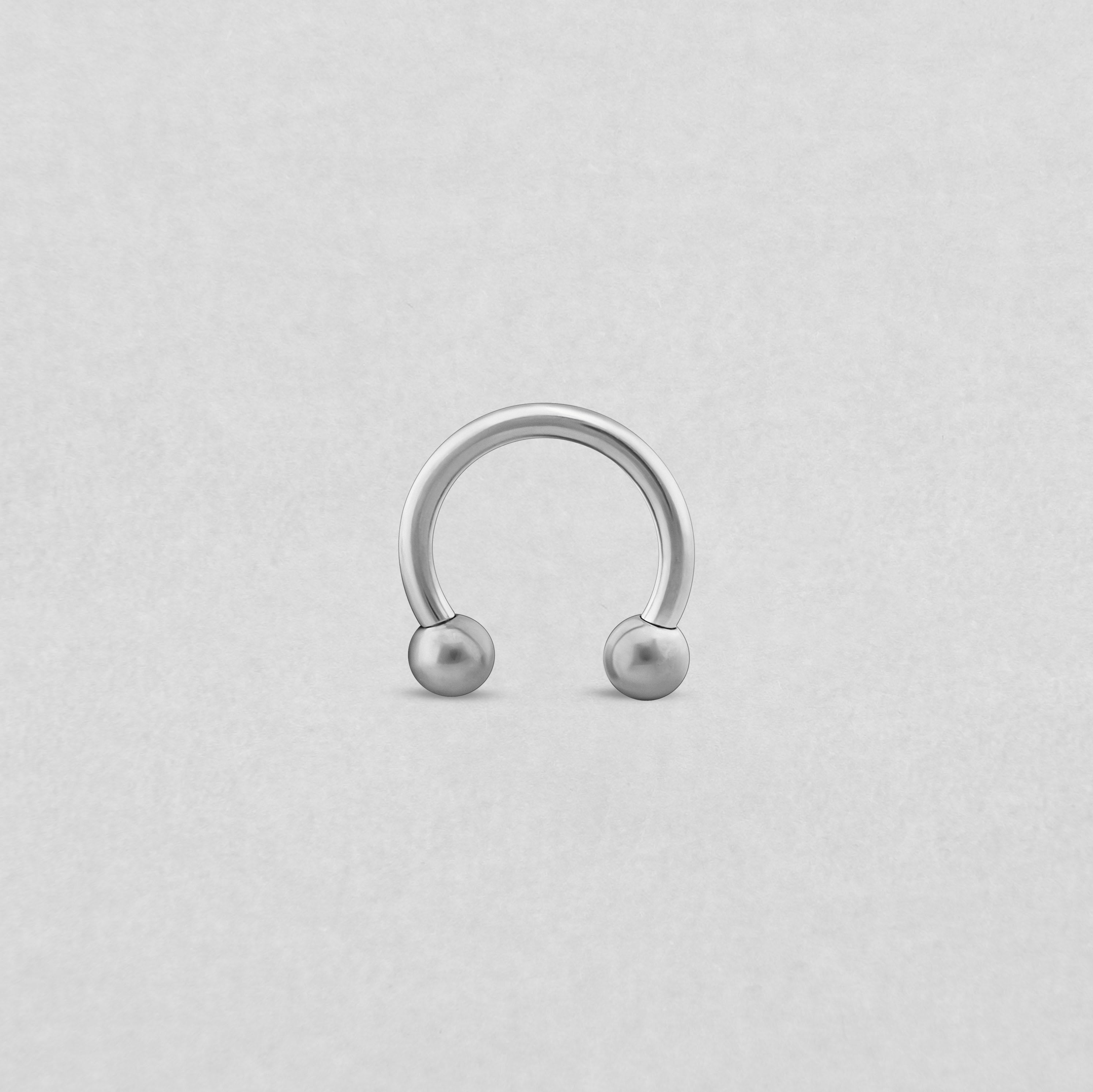 BARRE CIRCULAIRE ARGENTÉE